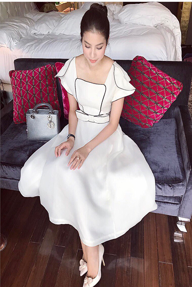 Đầm dự tiệc tùng xòe viền đen đính nơ